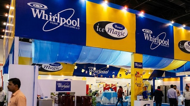 Whirlpool pavilion at ICE Mega Expo — blue and yellow booth with Ice Magic branding